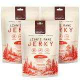 Three packages of Lion's Mane Spicy Jerky with nature-themed design on a white background