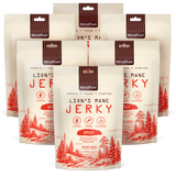 Six packages of Lion's Mane Spicy Jerky with nature-themed design on a white background